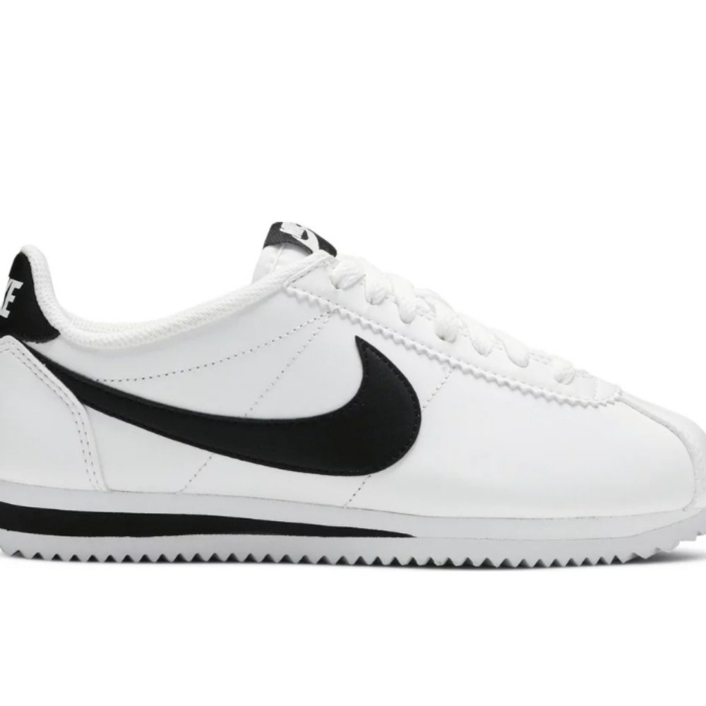 White and black Nike Cortez